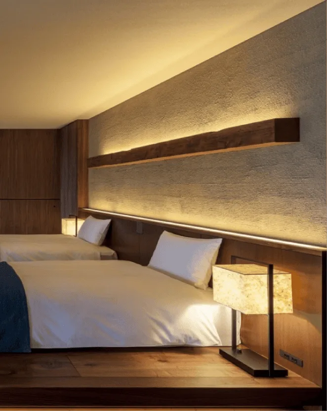 Jolysand hotel bedroom textured feature wall